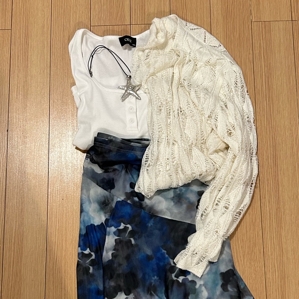Cropped, ribbed, white tank top.